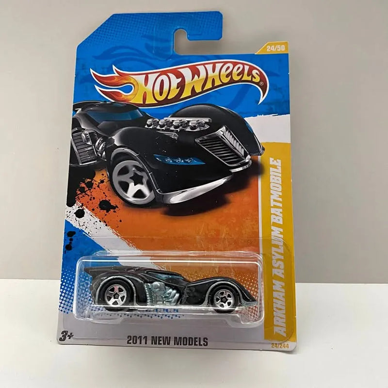 Black Hot Wheels batmobile diecast car in clear blister package, 2011 New Models label