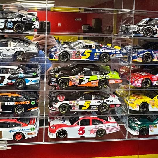 Assorted NASCAR 1:24 diecast race cars in clear case; number 5 and 48 visible