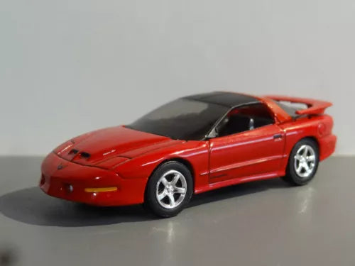 Red and black diecast toy car model, sports coupe with white wheels