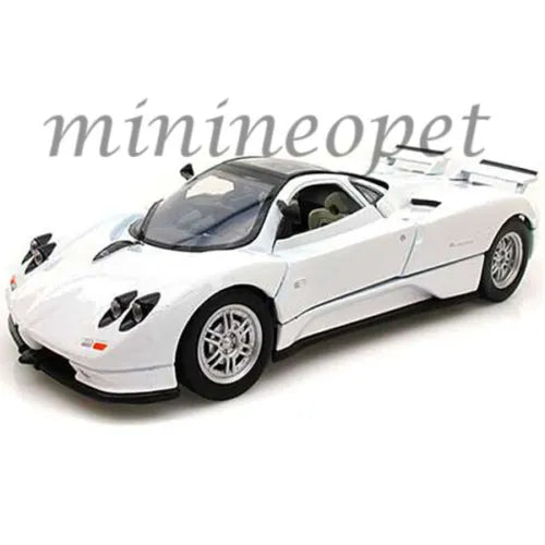White diecast model sports car with open-wheel design, 1:24 scale