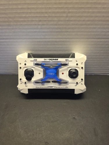 SkyDrones FX mini pocket drone controller with dual joysticks, front panel