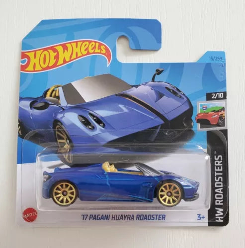 Blue 1:64 diecast toy race car with gold wheels and black spoiler.