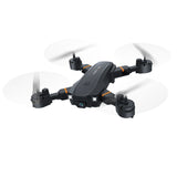 Compact mini drone with front camera and four propellers, black and gray body.