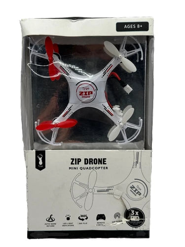 Mini quadcopter toy drone with 4 propellers, white body with red accents, in box