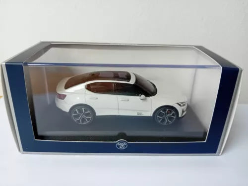 Diecast model car in display box, white body with dark roof and wheels