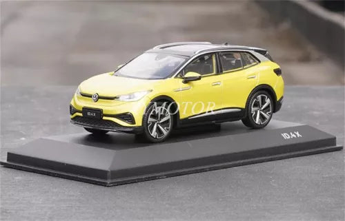 Yellow VW ID.4X electric SUV diecast model car on black display base, front view