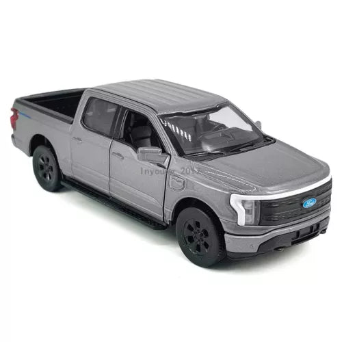 1:36 Ford F-150 Lightning diecast pickup model car, gray, front 3/4 view, opening doors