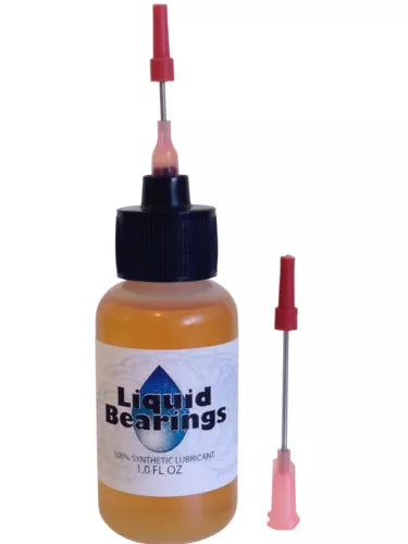 Liquid Bearings lubricant oil bottle with red-topped dropper, amber liquid