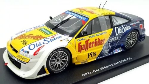1/18-scale diecast Opel Calibra DTM race car model, yellow/white with decals