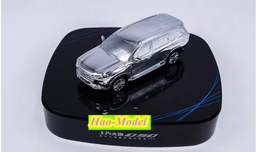 Silver diecast SUV model car with chrome details on black display base