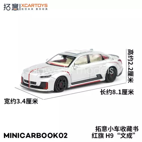 Silver and red diecast car model, front 3/4 view, collectible display scale.
