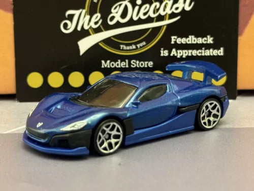 Blue and black 1:64 scale diecast sports car with opening hood, loose