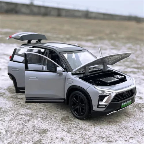 Light gray 1:32 alloy SUV diecast toy car model with open hood and doors