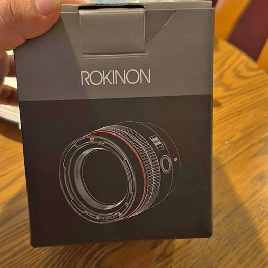 ROKINON camera lens box with illustrated 75mm lens, T1.9 marking