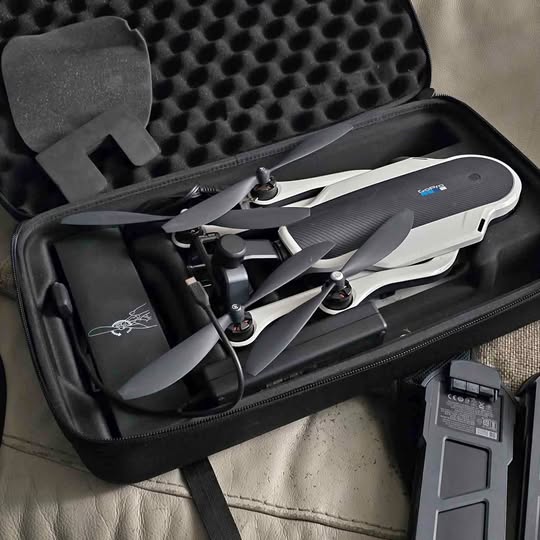 GoPro Karma drone with gimbal, stored in hard case with extra batteries
