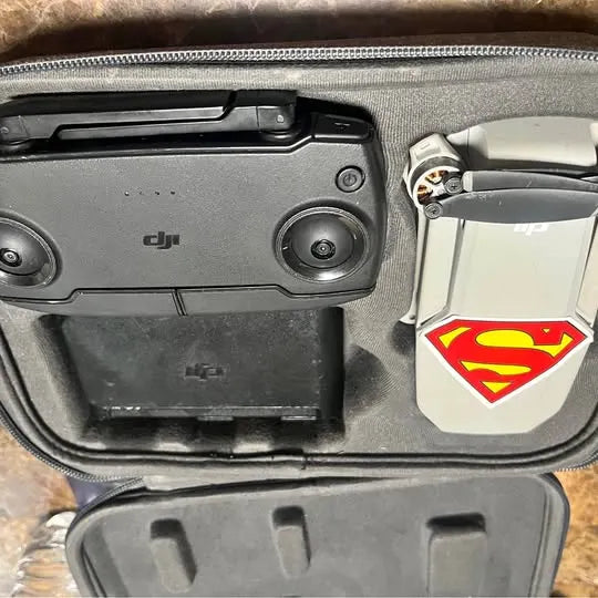 DJI remote controller with case, gray body and round control dial