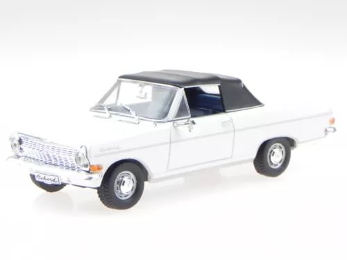 Convertible diecast model car, white with black roof, front three-quarter view.