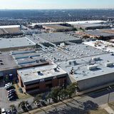 Aerial view of an industrial warehouse complex with multiple buildings