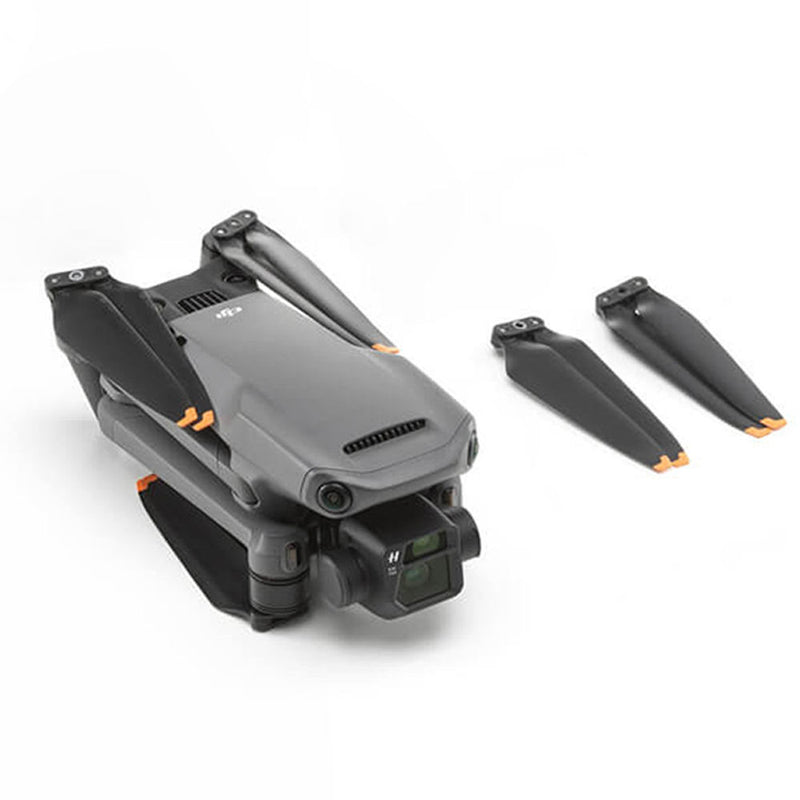 Foldable gray drone aircraft with front camera and four arms, motor guards visible