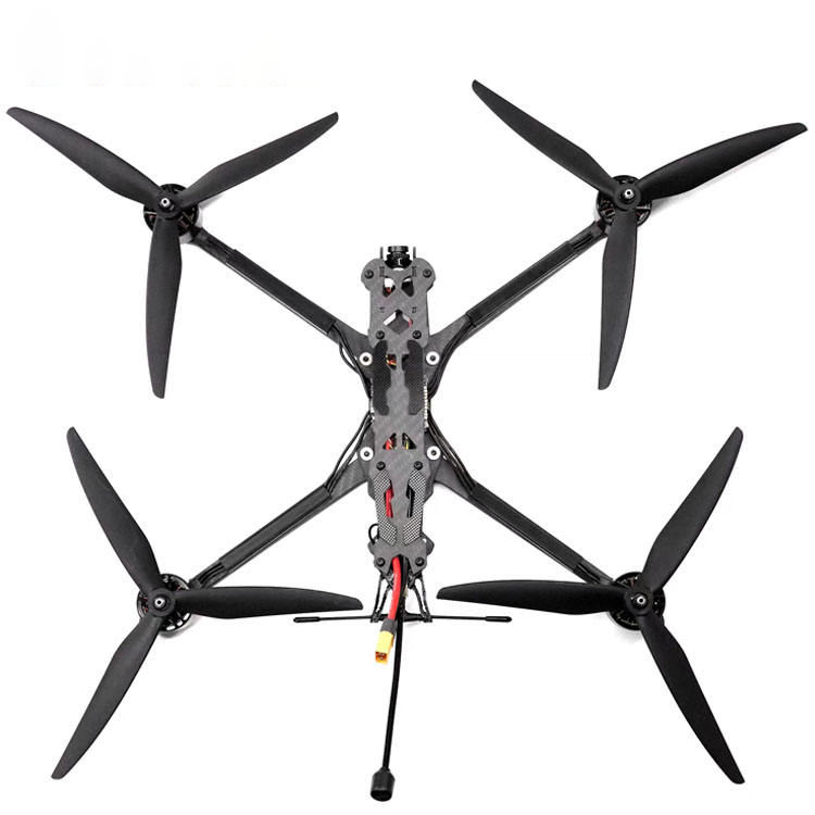 FPV racing drone with four propellers, central camera module, and front antenna