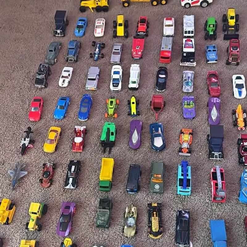 Diecast toy car assortment with assorted colors and styles, shown in a grid layout
