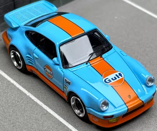 Blue and orange Gulf diecast toy car, 1:64 scale Porsche 911 model