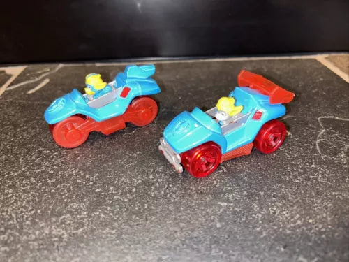 Paw Patrol super paws diecast car toys, two blue vehicles with red wheels and yellow seats