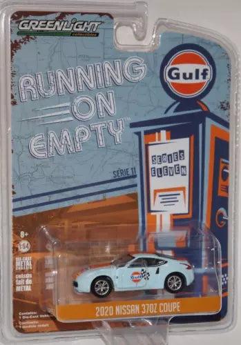 White 2020 Nissan 370Z coupe diecast model car in blister packaging with Gulf logo