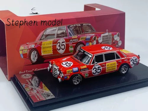 Red diecast race car toy, number 35, in box