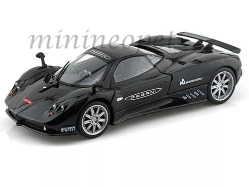 Black diecast sports car model with front splitter, side decals, and rear wing