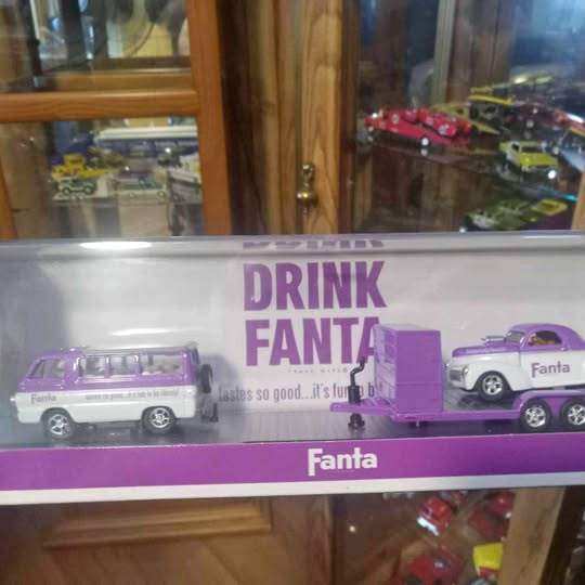 Purple and white Fanta die-cast car set in retail box, 'DRINK FANTA' text
