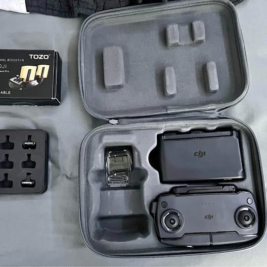 Zippered hard case with compartments for DJI drone controller and accessories