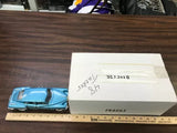 Blue 1:24 scale diecast car model, with box and packing.