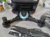 4K long-range GPS drone with propeller arms and central camera housing