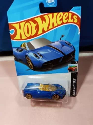 Blue diecast roadster toy car in Hot Wheels blister packaging