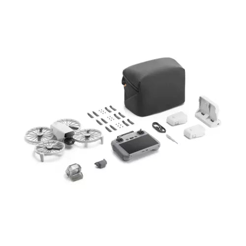 Camera drone kit with remote, batteries, propellers, and carrying case