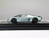 Ice blue sports car model diecast resin, side view with black wheels and accents