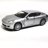 Chrome silver 1/36 diecast car toy with hard top, front three-quarter view, spinning wheels