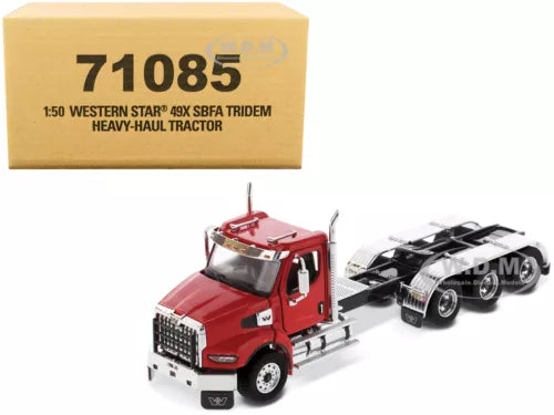 Red diecast heavy-haul tractor cab with open flatbed and black hauling unit