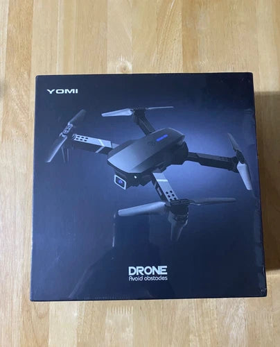 YOMI drone product box with printed drone and “DRONE avoid obstacles” text