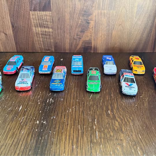 Diecast racing car lot of 11, assorted colors and graphics