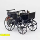 Black diecast model carriage with spoked wheels and detailed engine