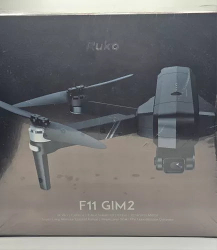 Grey quadcopter drone with attached camera and stabilized gimbal