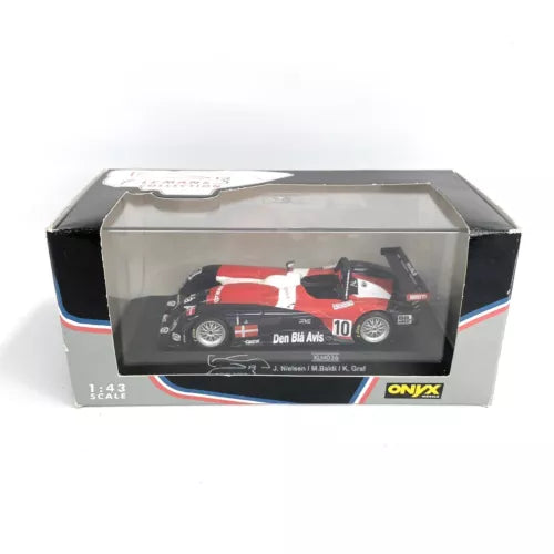 1:43 diecast race car model in box, red white black #10 with Onyx logo