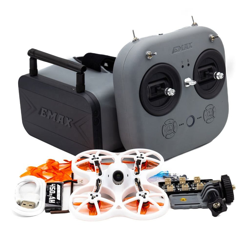 FPV drone kit with gray controller, white quadcopter, antennas and goggles