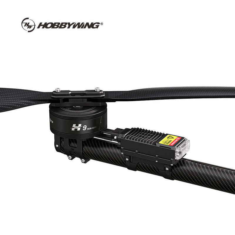 Carbon fiber drone thrust system module with black motor housing and cooling fins
