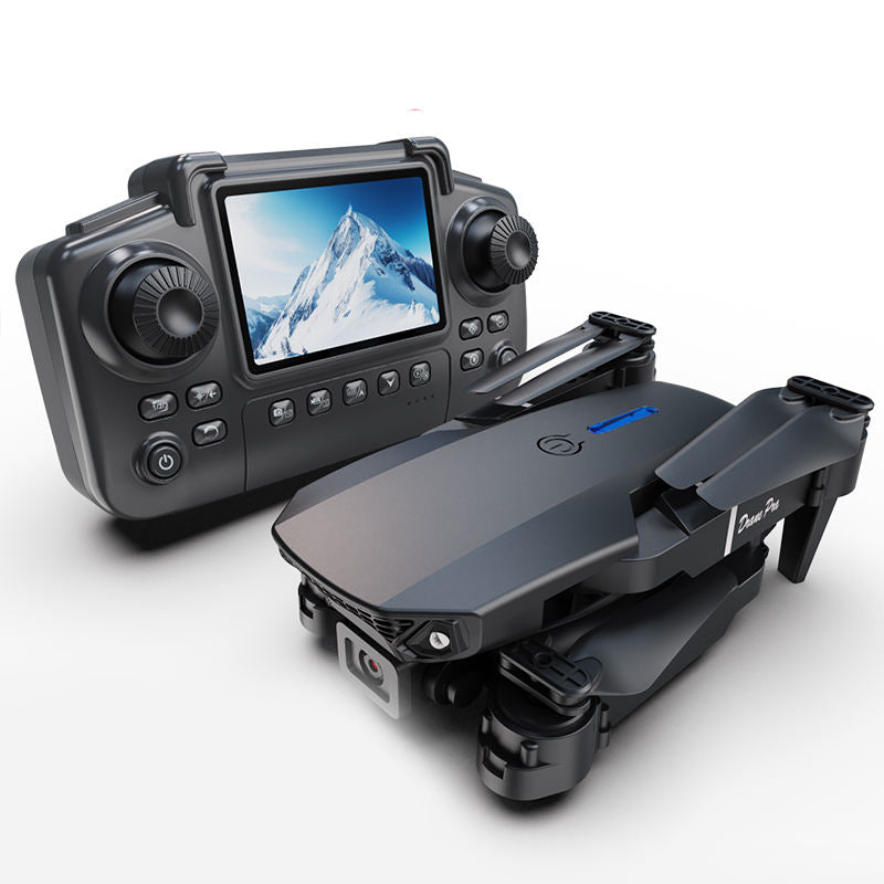 Mini quadcopter drone with handheld controller and blue-lit screen