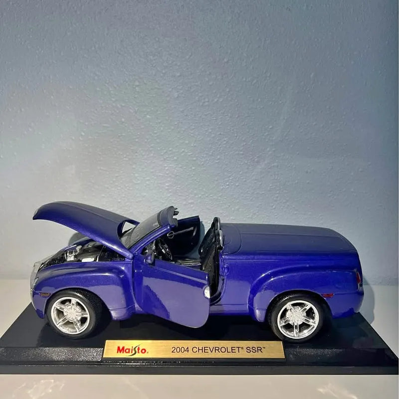 2004 Chevrolet SSR diecast pickup in metallic blue with open door