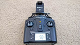 FPV drone controller with dual thumbsticks and LCD screen, dark gray