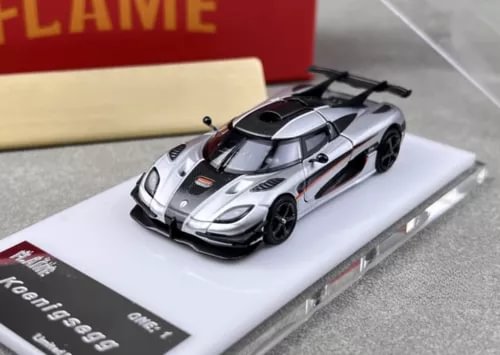 Silver and black super racing diecast metal sports car with front aero details